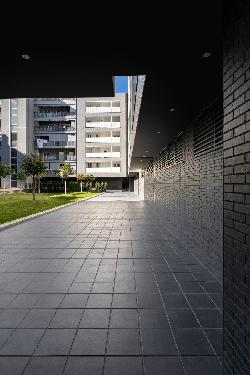 The courtyard has grey tiling