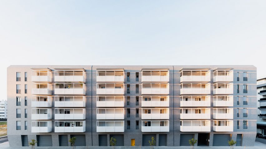 Alvisi Kirimoto designs affordable housing complex with perforated metal balconies