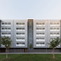 Alvisi Kirimoto designs affordable housing complex with perforated metal balconies