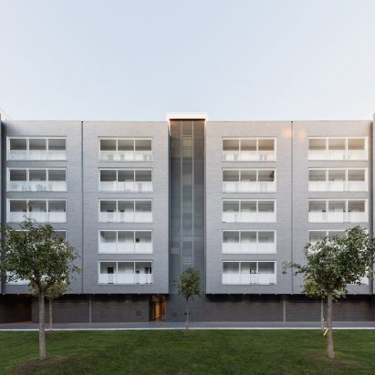 Alvisi Kirimoto designs affordable housing complex with perforated metal balconies