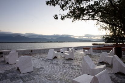 A waterfront with angular street furniture