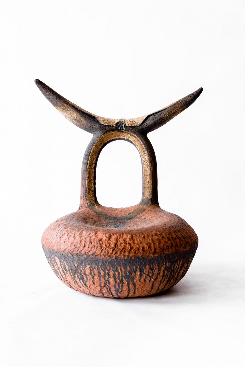 Horned red terracotta chair