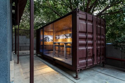 The shipping container has chipboard interiors