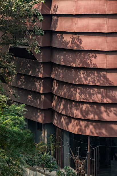 The facade is removed of its windows by Architecture Discipline