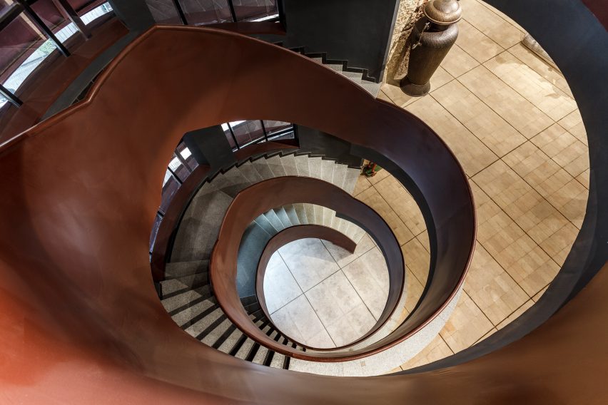 A staircase spirals through the building