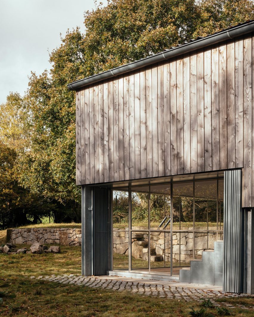 A wood and glass facade of Art Barn