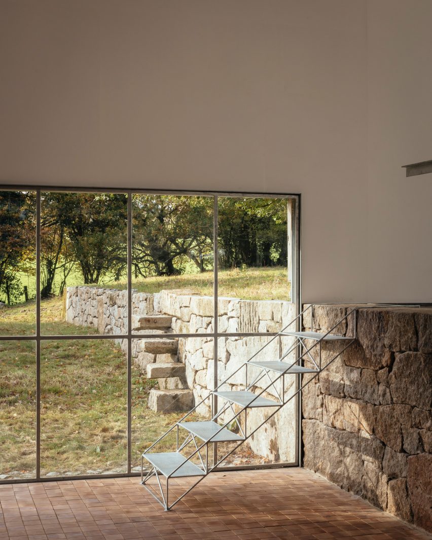 A stone wall inside an art studio