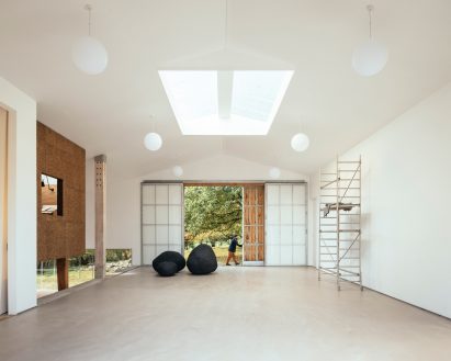 A white-walled studio in an old barn