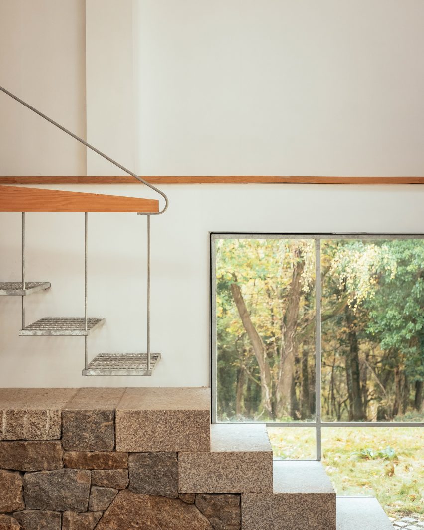 A staircase with a stone base