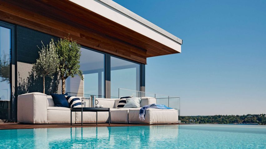 Asker sofa by Martin dos Santos for Skargaarden on a poolside deck