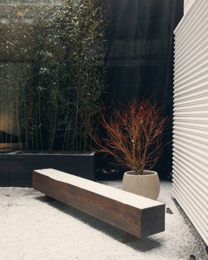Bench made of reclaimed beam in the garden