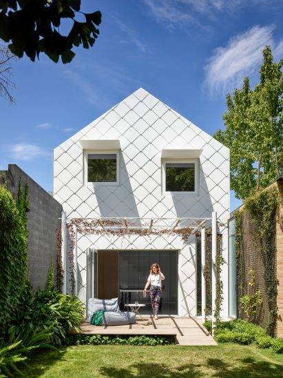 It has irregularly placed windows by Austin Maynard Architects