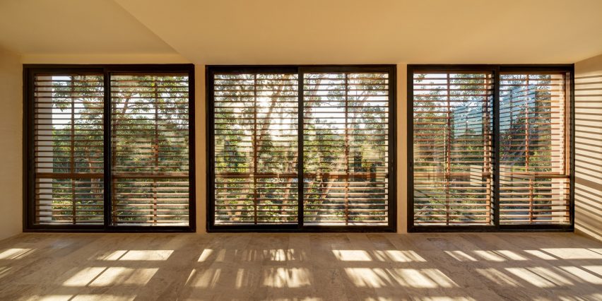 Wooden louvres create shadows