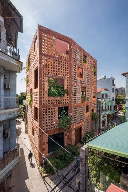 The house has a ceramic brick exterior by Vo Trong Nghia Architects