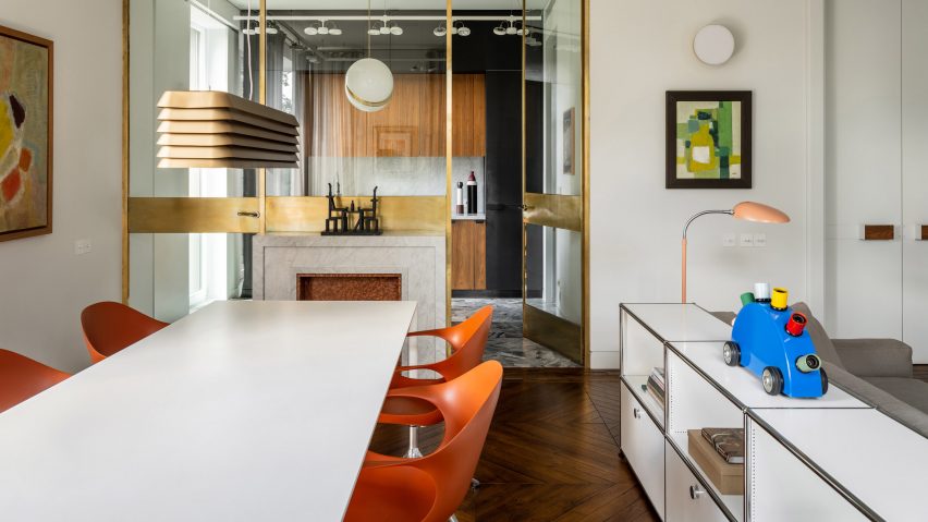 Dining room and kitchen of the Apartment of Basta by Blockstudio