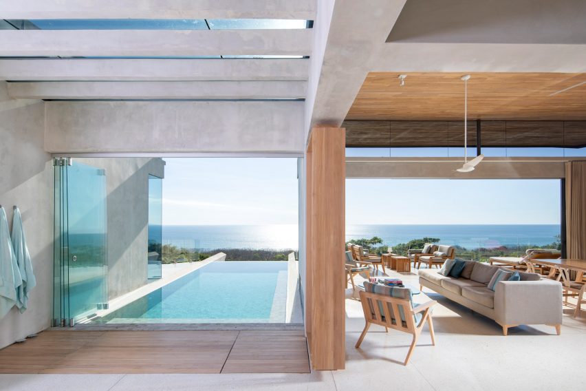 The swimming pool overlooks the blue water