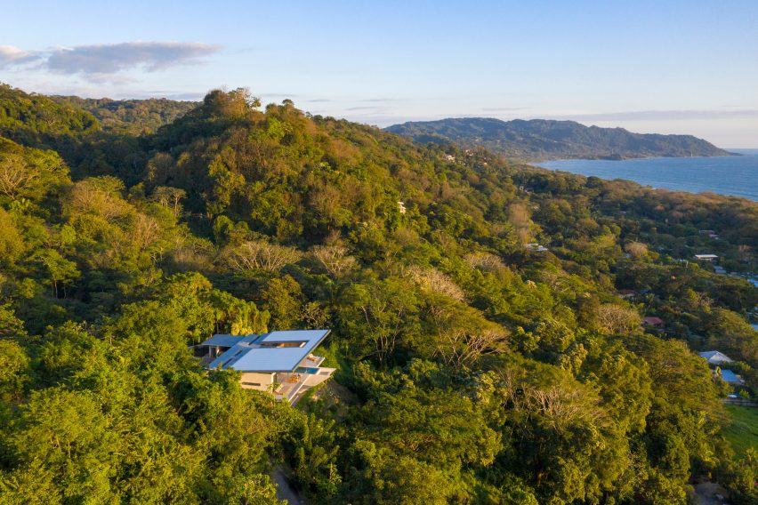 Casa Bell-Lloc by Studio Saxe is on a hillside