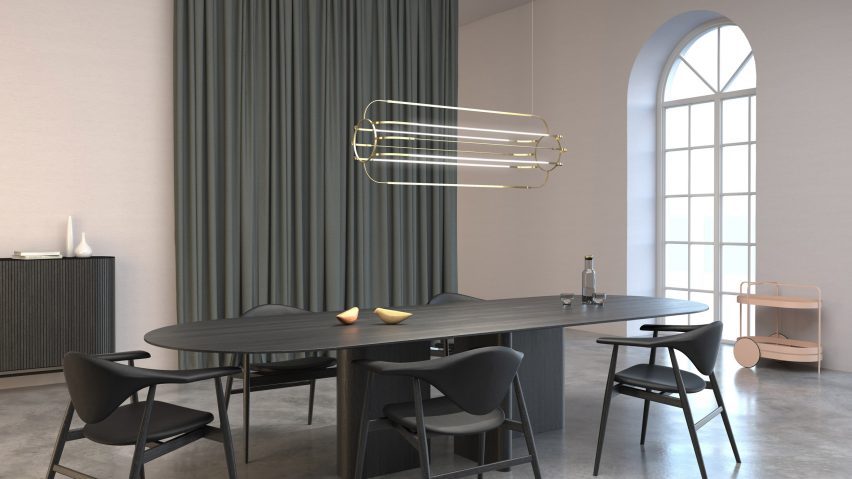 Charlotte pendant light by Daniel Becker Studio above a dining table