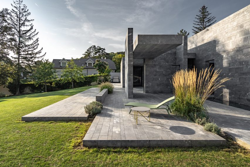 A monolithic private spa made from blocks of stone