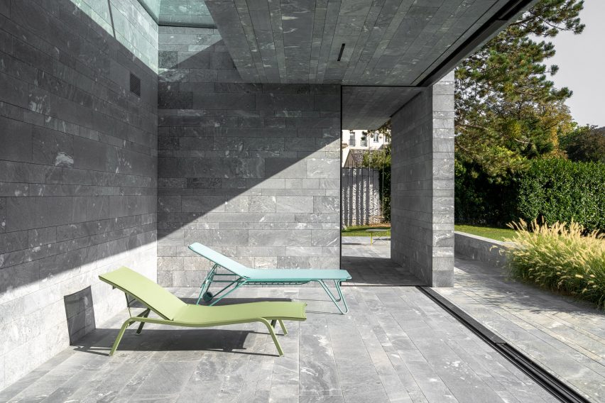 The monolithic stone exterior of a private spa in Austria