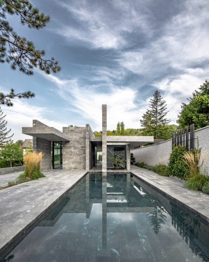 A private stone spa and swimming pool