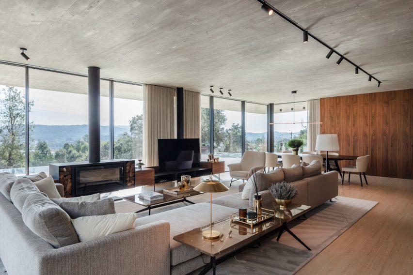 Sofa group and TV corner in concrete house in Portugal