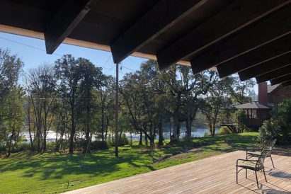 Landry Smith designed the deep hanging gable roof