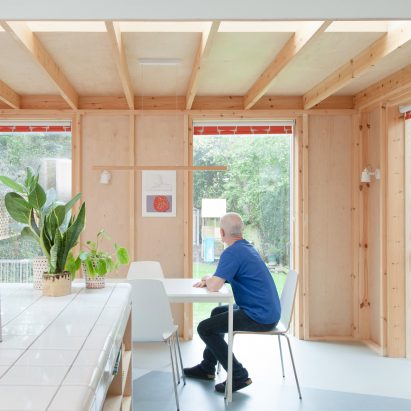 The wood-lined kitchen of a London house