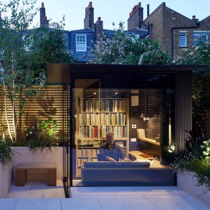 A small glass-lined garden studio