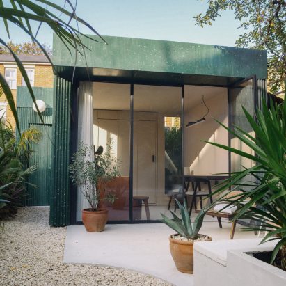 A garden studio clad in green terrazzo