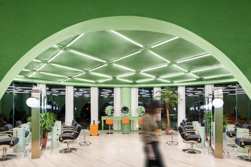 Main salon space with green walls