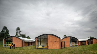 The volumes have white roofs