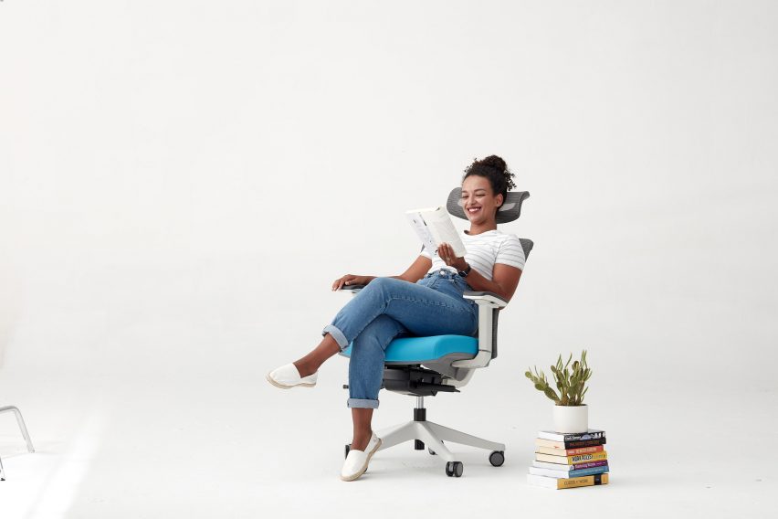 User relaxing in ergonomic office chair