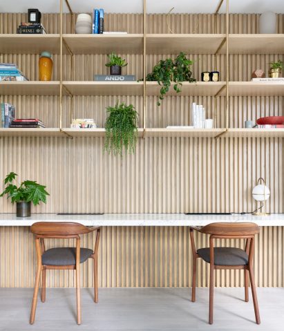 Home office with built-in shelving in Grosvenor Residence