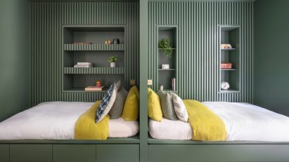Kids bedroom with green cabin beds in Grosvenor Residence