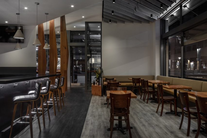 The restaurant includes dark vinyl floors