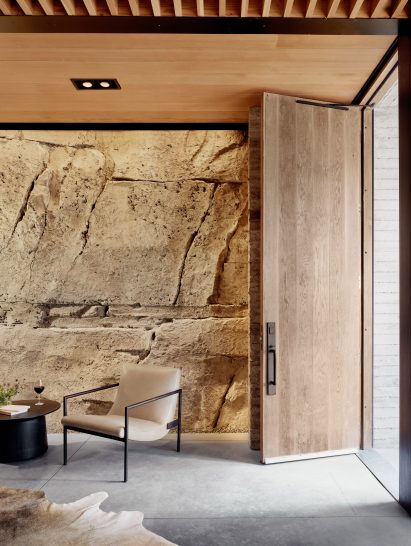 Sprayed concrete walls in Texas wine cellar by Clayton Korte