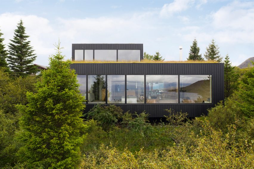 A rural holiday home clad in blackened timber