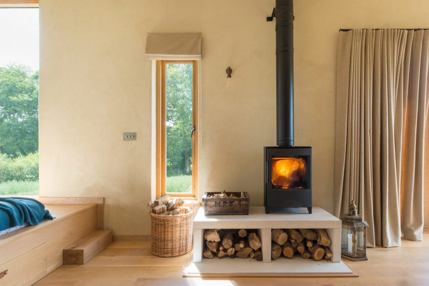 A cabin with a wood-burning stove