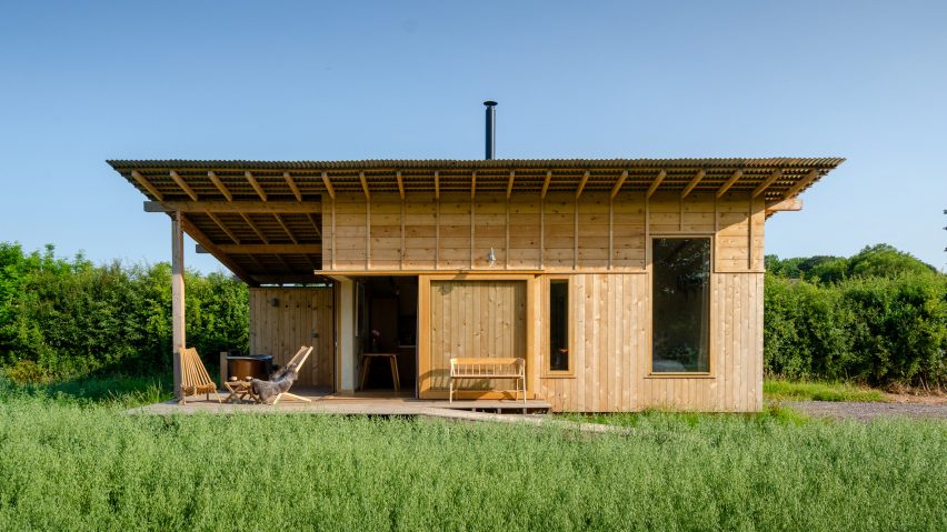 A wooden cabin by Out of the Valley
