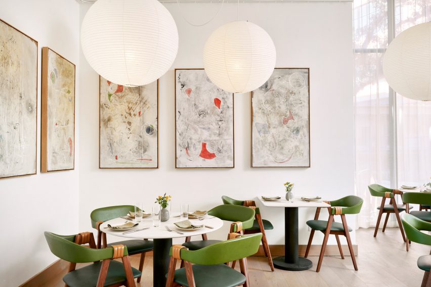 The restaurant has a green theme