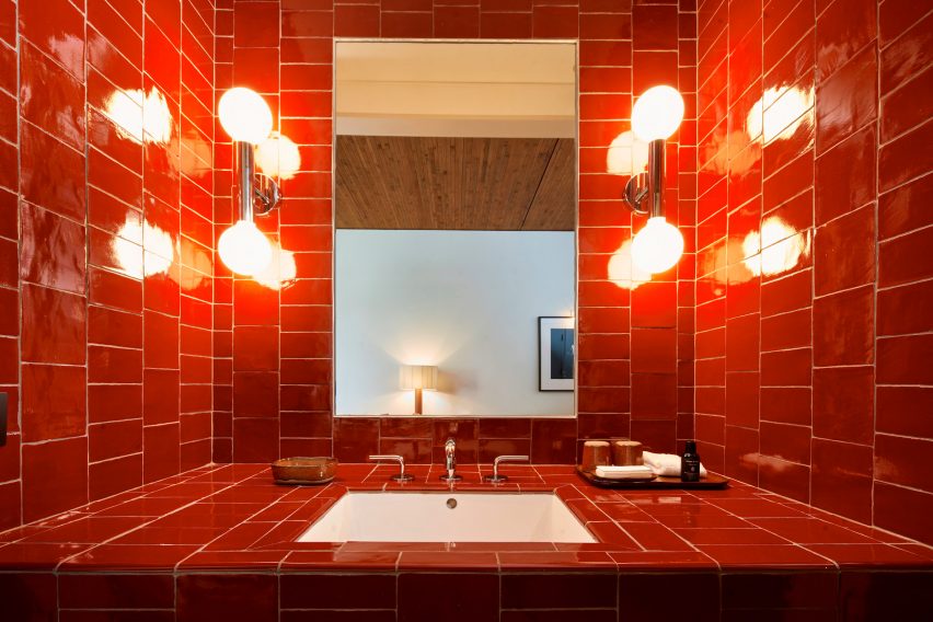 A red tiled bathroom