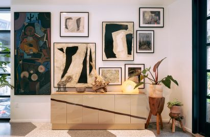 A cluster of collages hang on the main lobby's walls