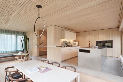 Kitchen with pendant by Michael Anastassiades for Flos