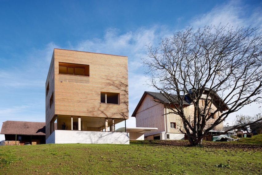 A timber-clad house in an Austrian village
