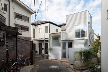 White building in Tokyo with large windows