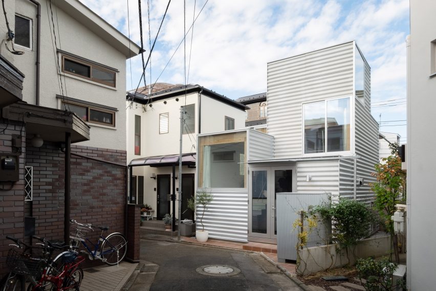 White building in Tokyo with large windows