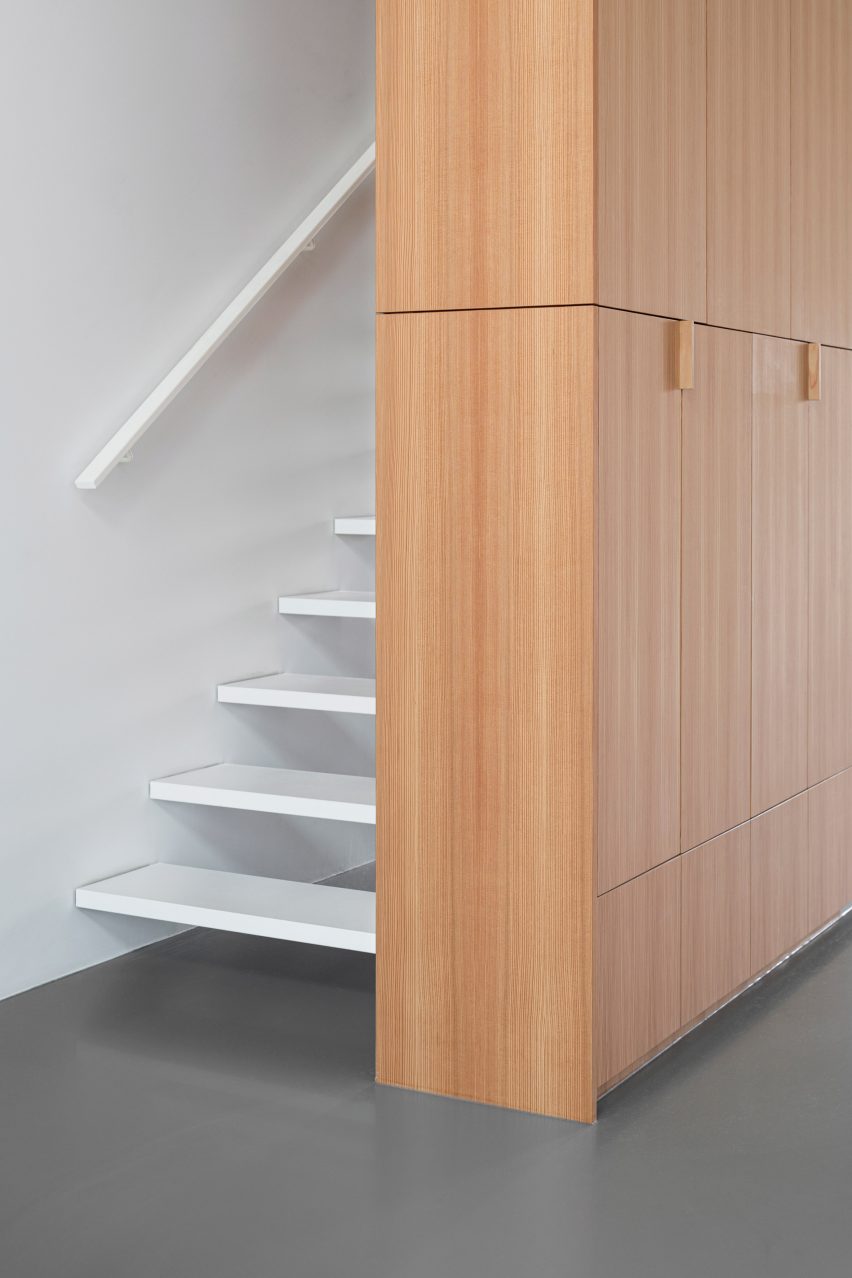 Stairs and shelving in Home for the arts by i29