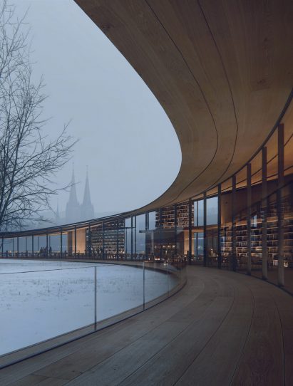A visual of a curved building built from wood