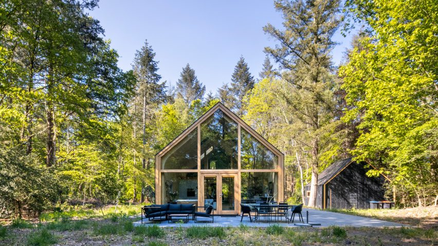 A forest cabin with a glazed gable end